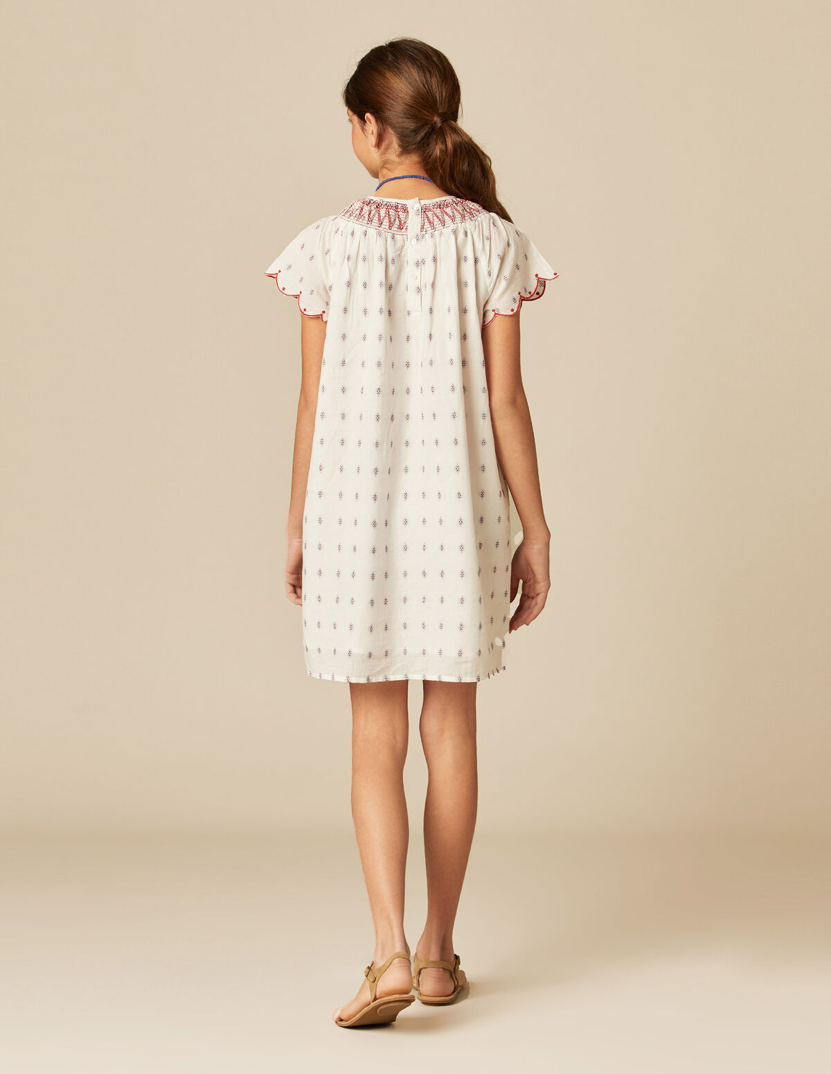VESTIDO BLANCO BORDADOS ROJO