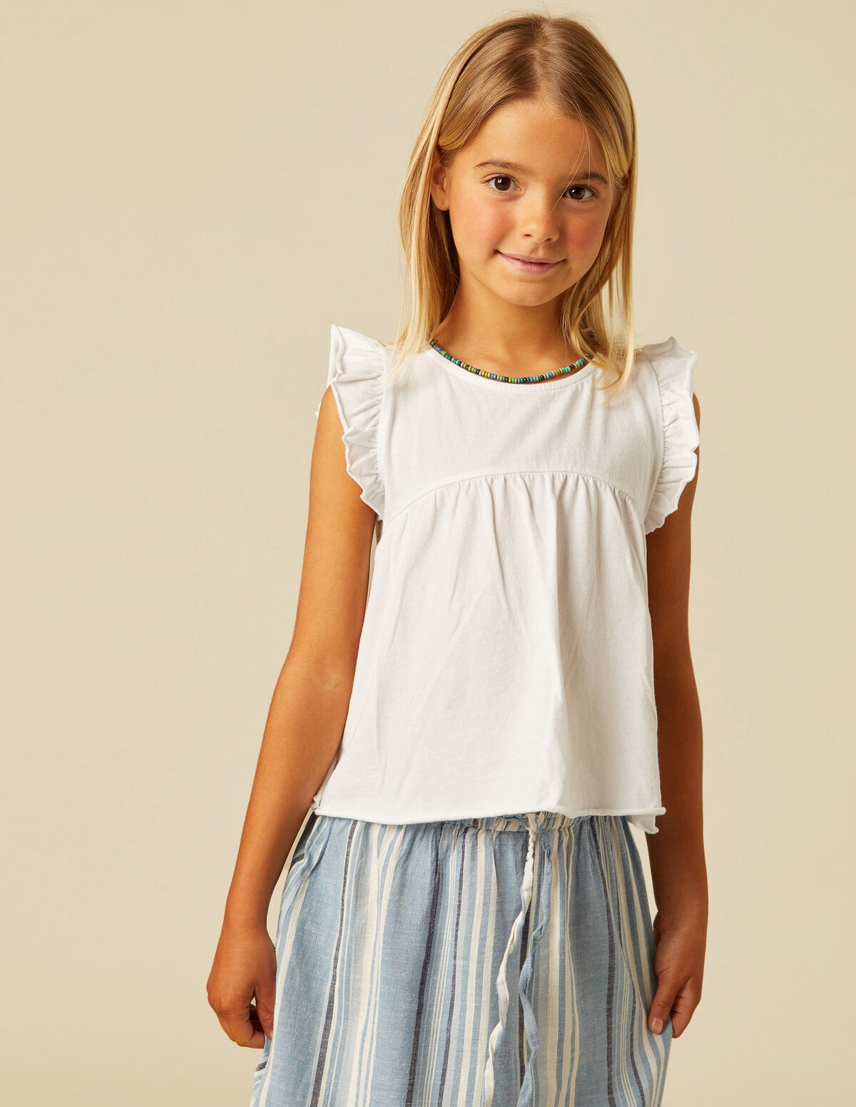 CAMISETA VOLANTE BLANCA