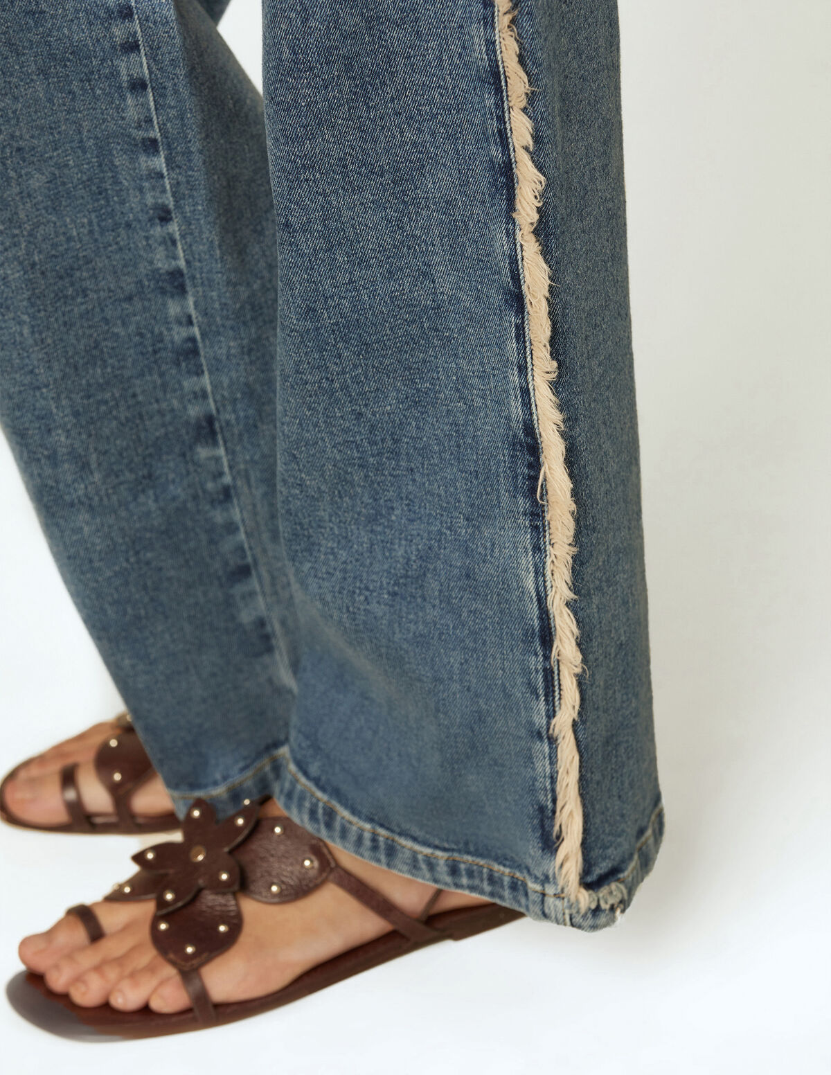 WHITE FRINGED TROUSERS