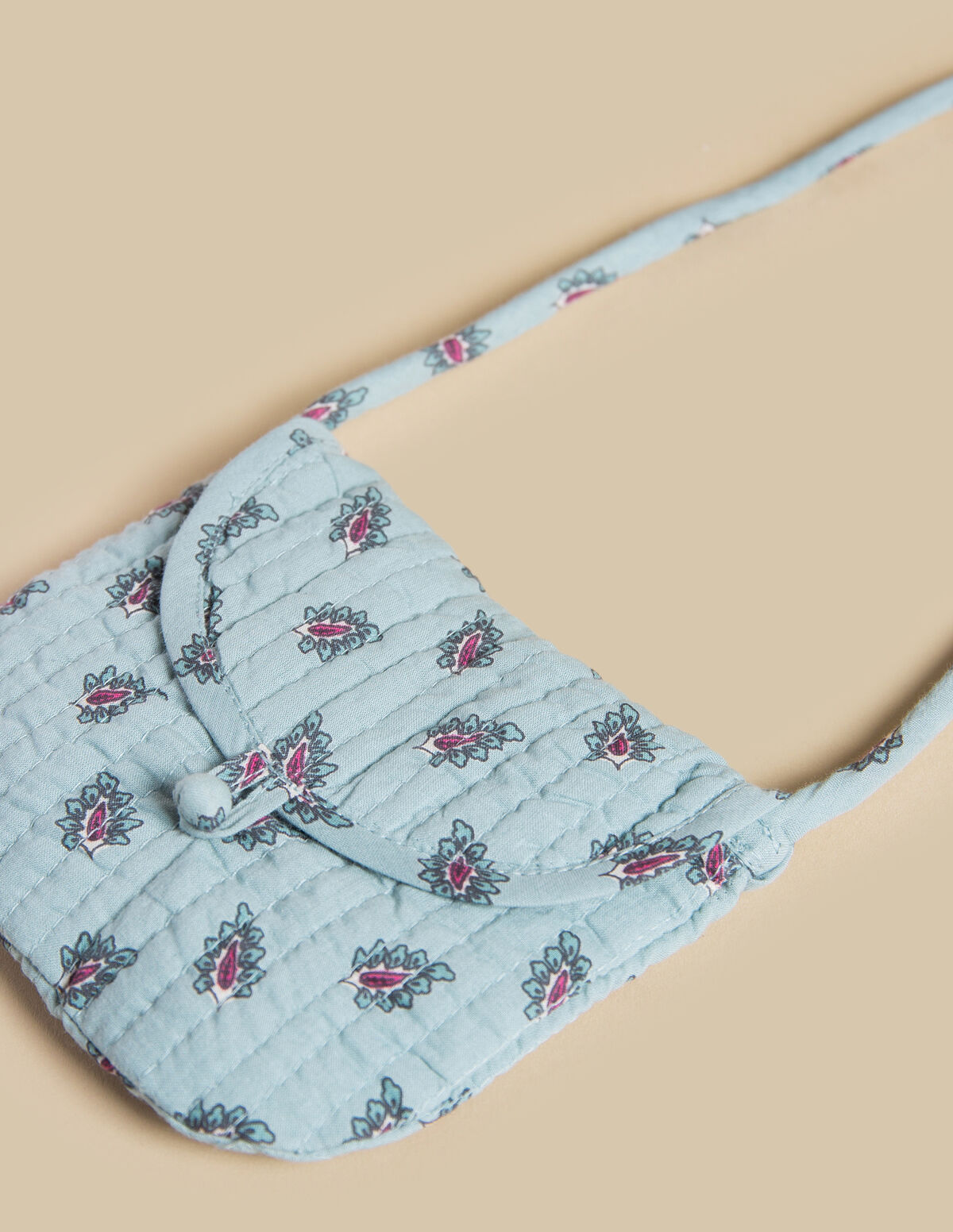 BANDOLERA BEBÉ HOJAS
