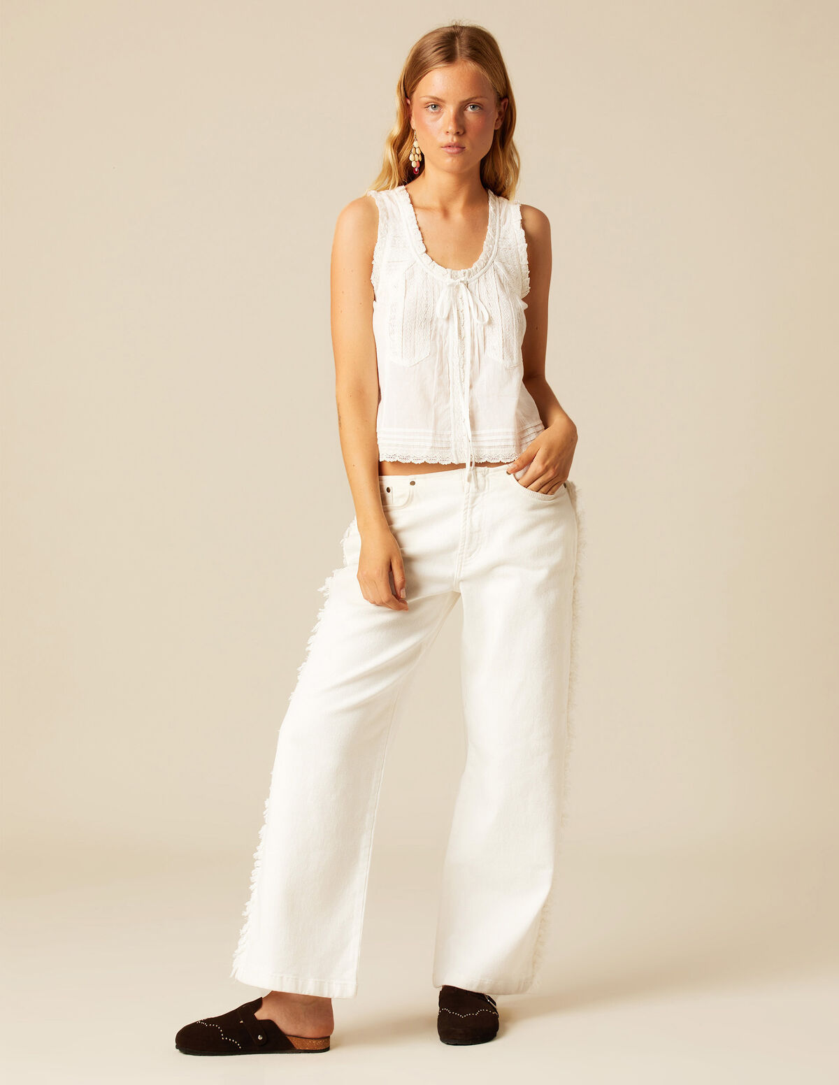 PANTALON FRANGES CÔTÉ BLANC