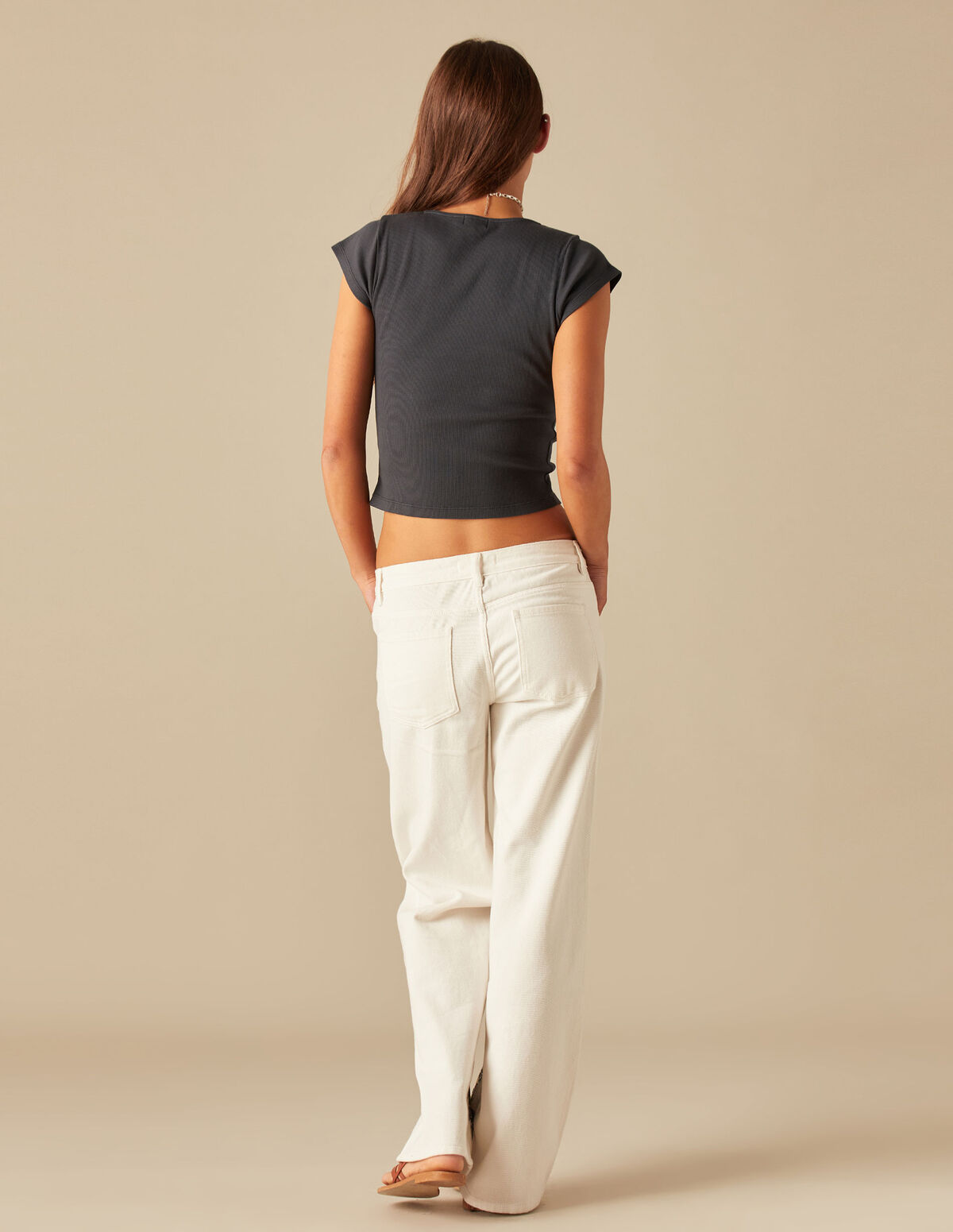 CAMISETA BLANCA BOTONES LATERAL