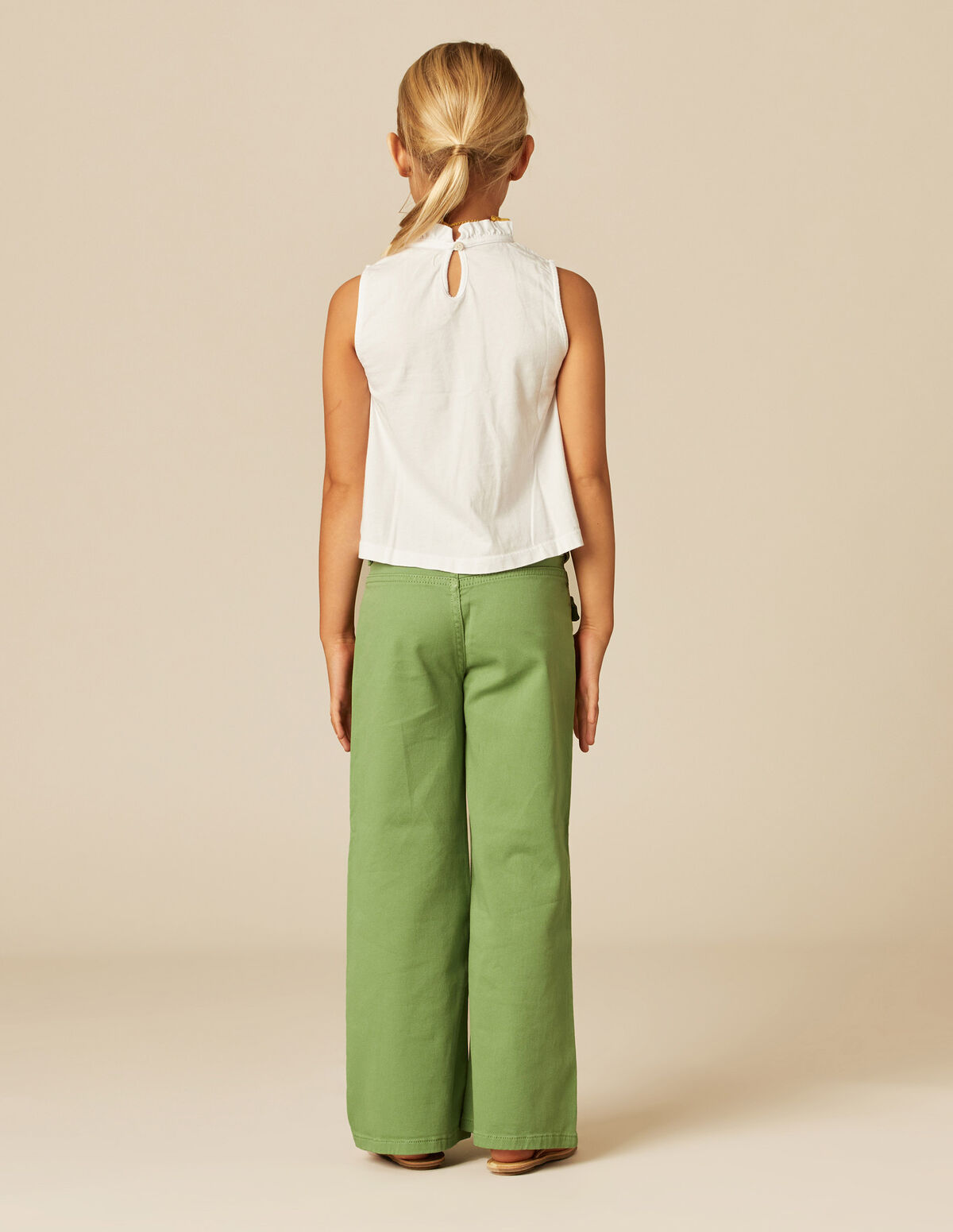 PANTALÓN BOLSILLOS TAPETA VERDE