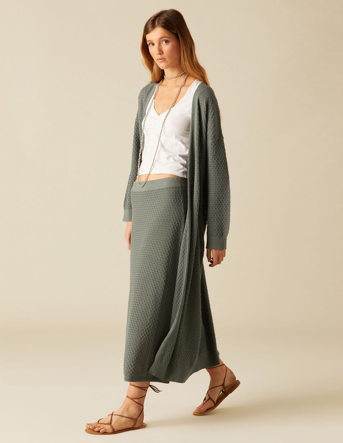 CHAQUETA PUNTO LARGA GRIS