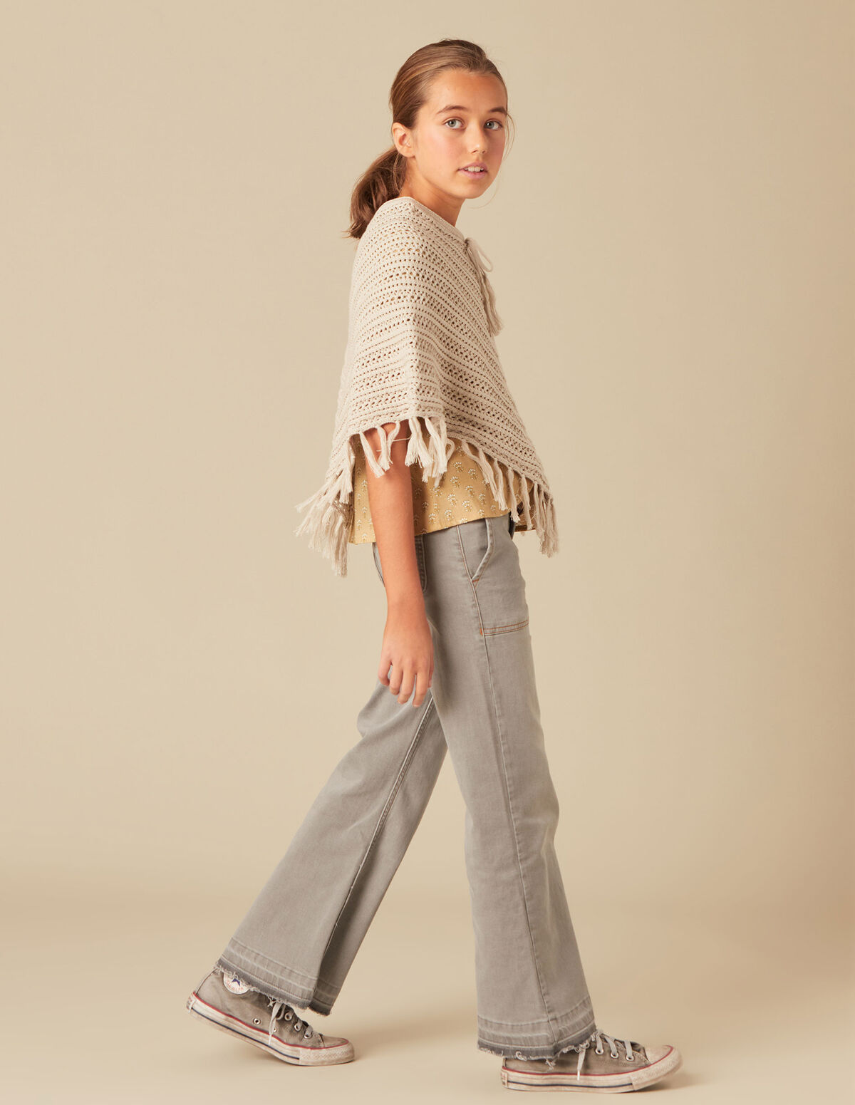 FRINGED KNIT PONCHO