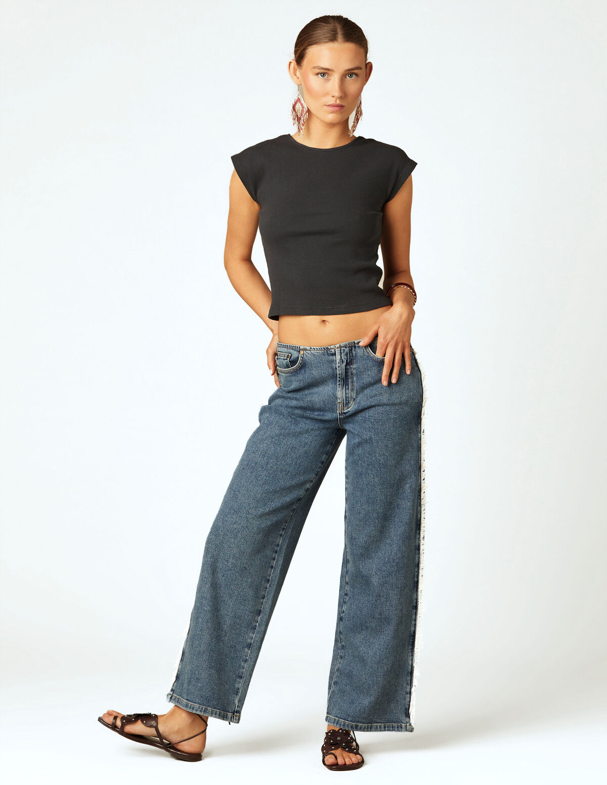 WHITE FRINGED TROUSERS