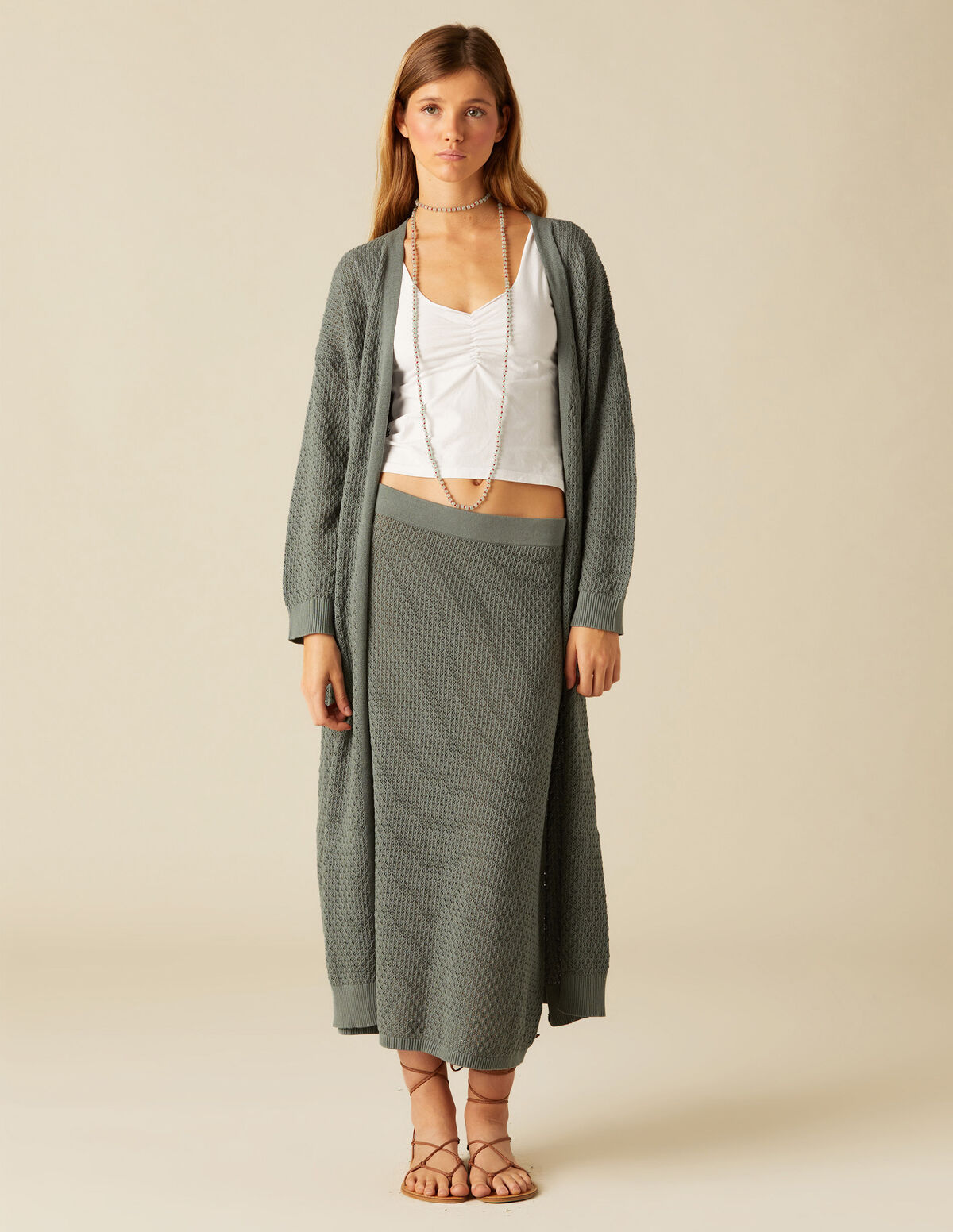 CHAQUETA PUNTO LARGA GRIS