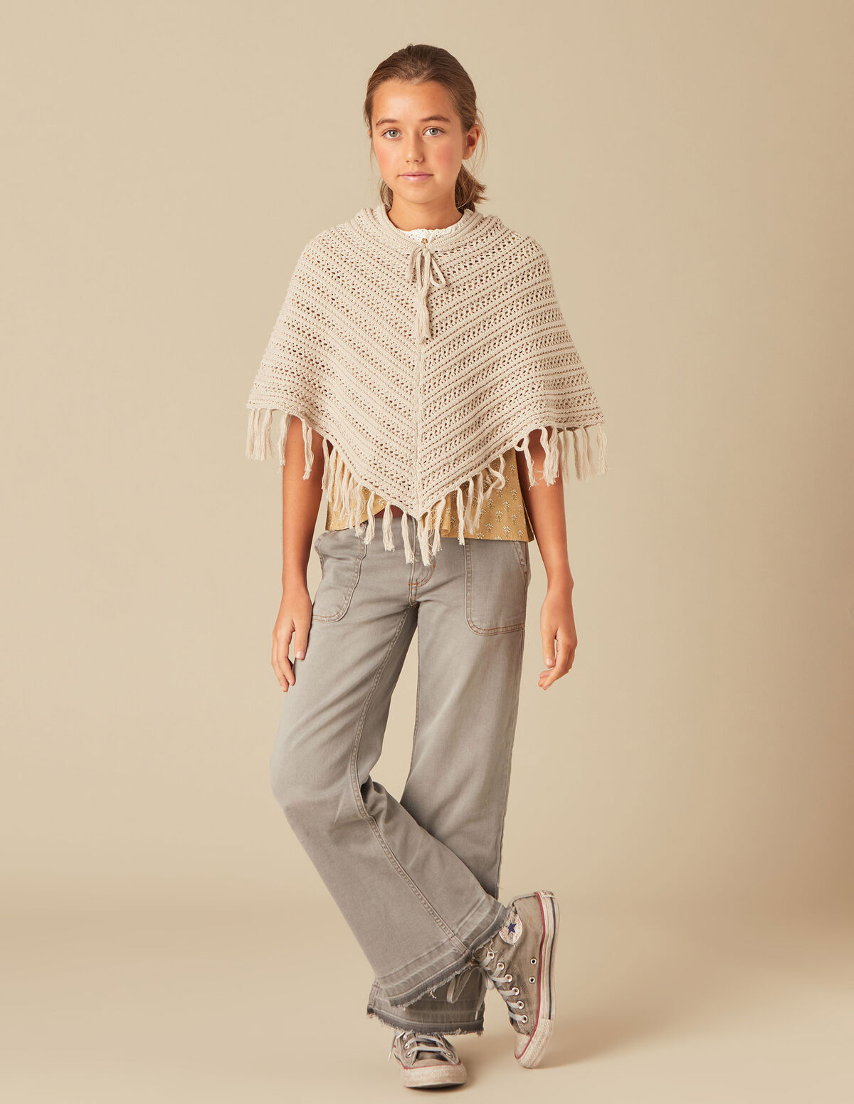 FRINGED KNIT PONCHO