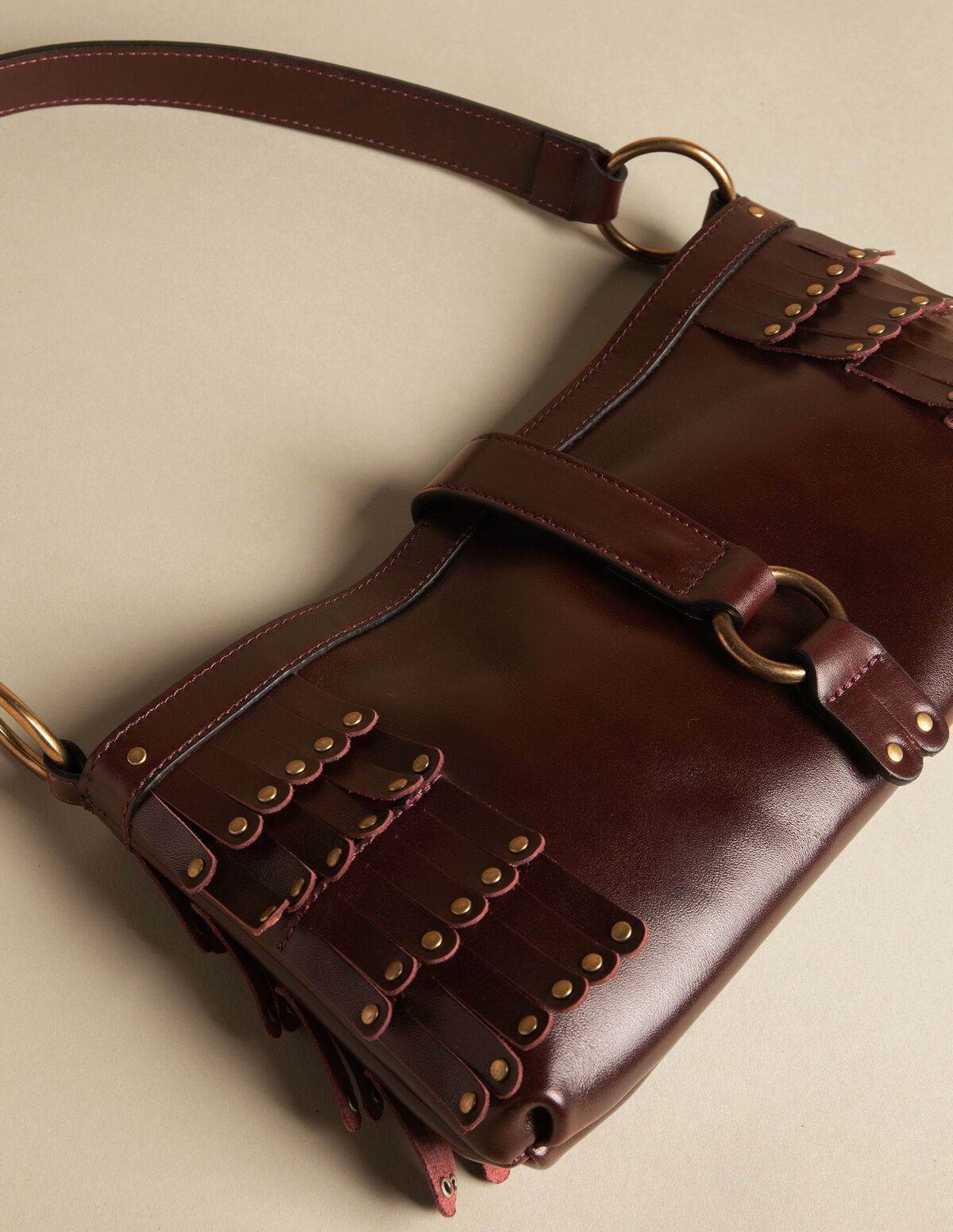 BROWN STUDDED AND FRINGED BAG