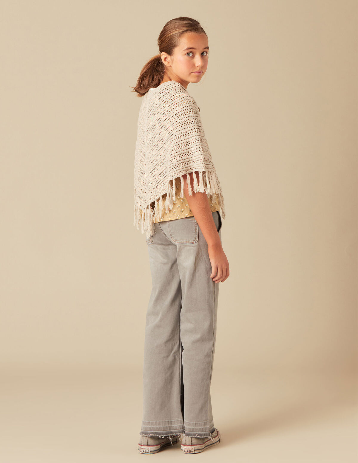 FRINGED KNIT PONCHO