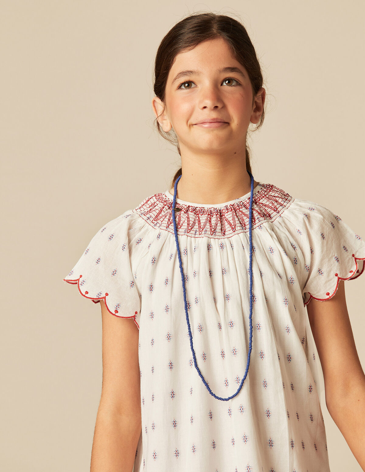 VESTIDO BLANCO BORDADOS ROJO
