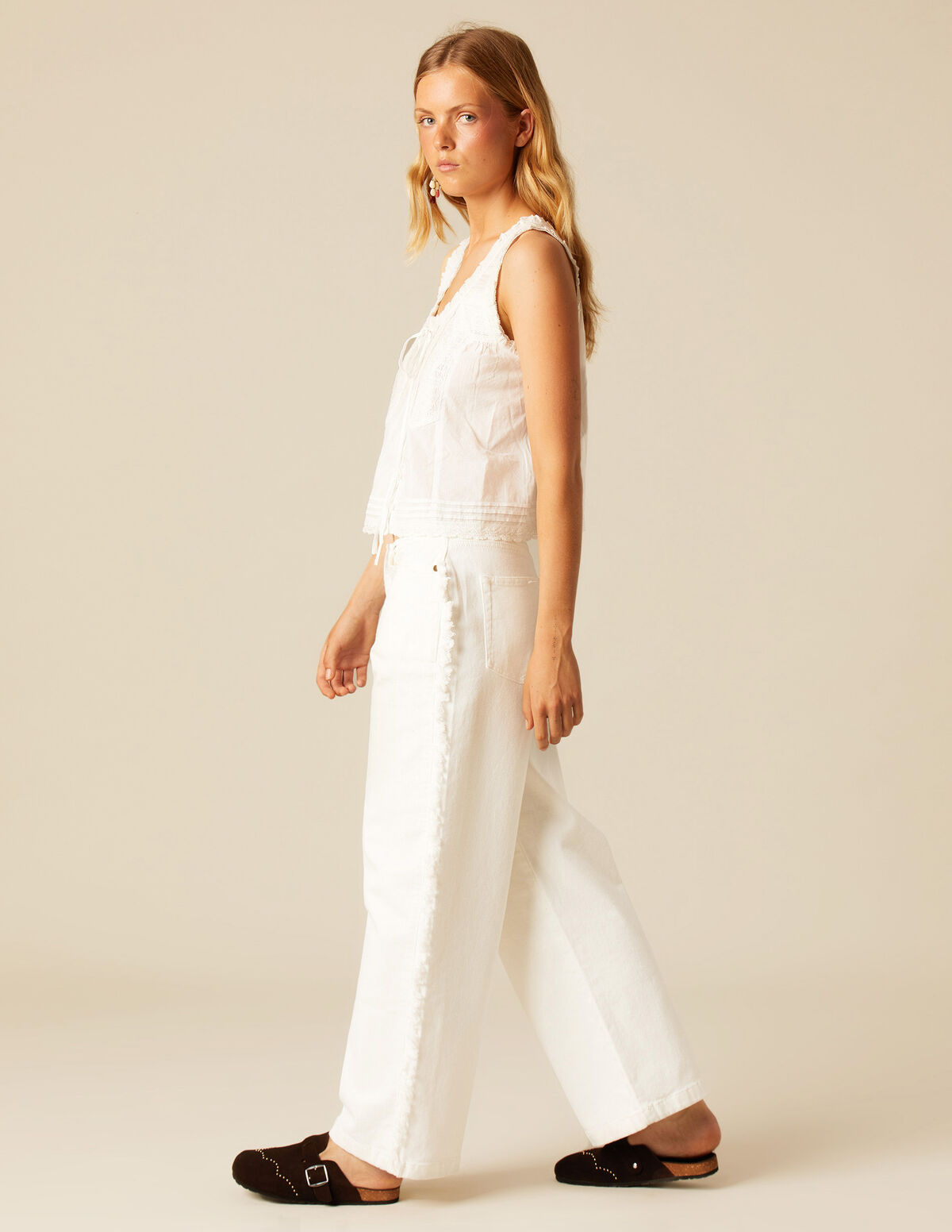 PANTALON FRANGES CÔTÉ BLANC