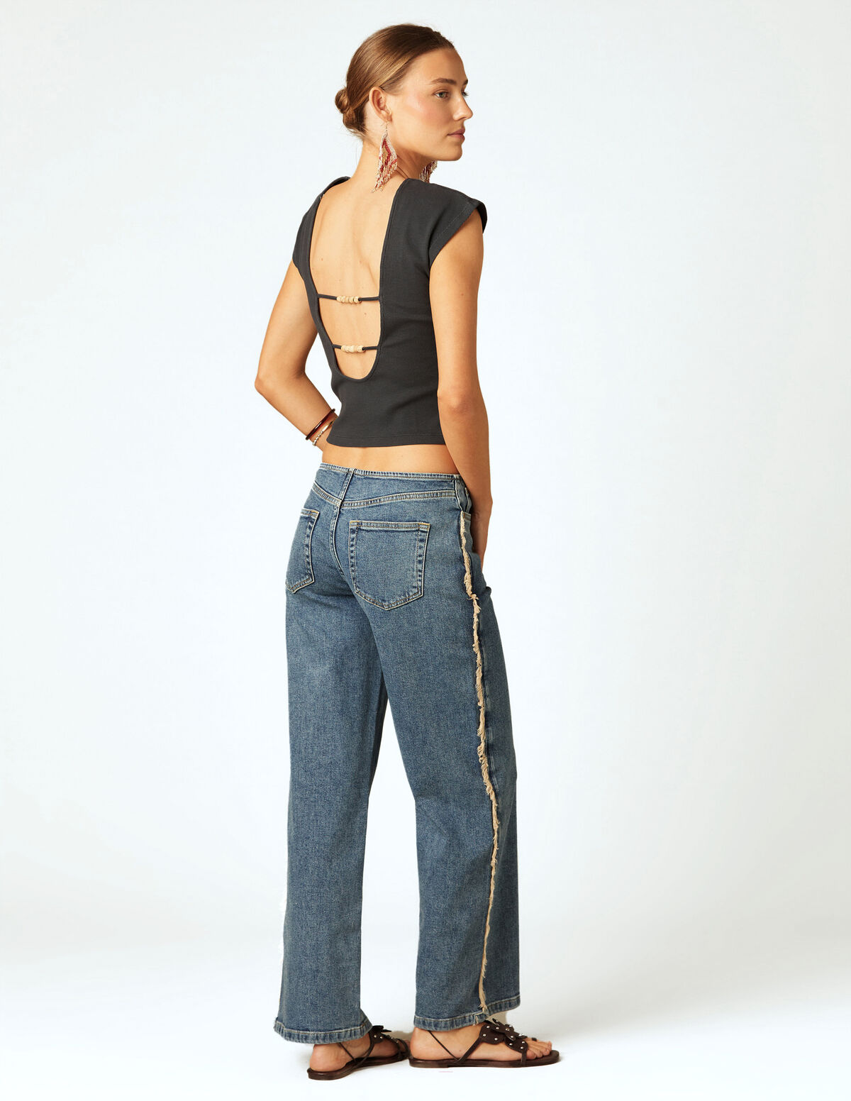 WHITE FRINGED TROUSERS