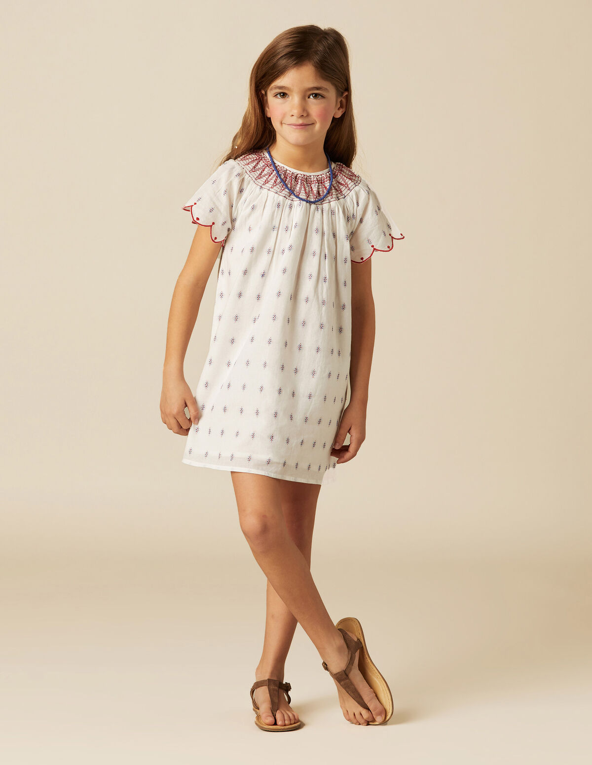 VESTIDO BLANCO BORDADOS ROJO